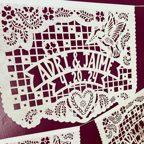 Personalized papel picado banners with hummingbird and heart design. Designed and made by Ay Mujer